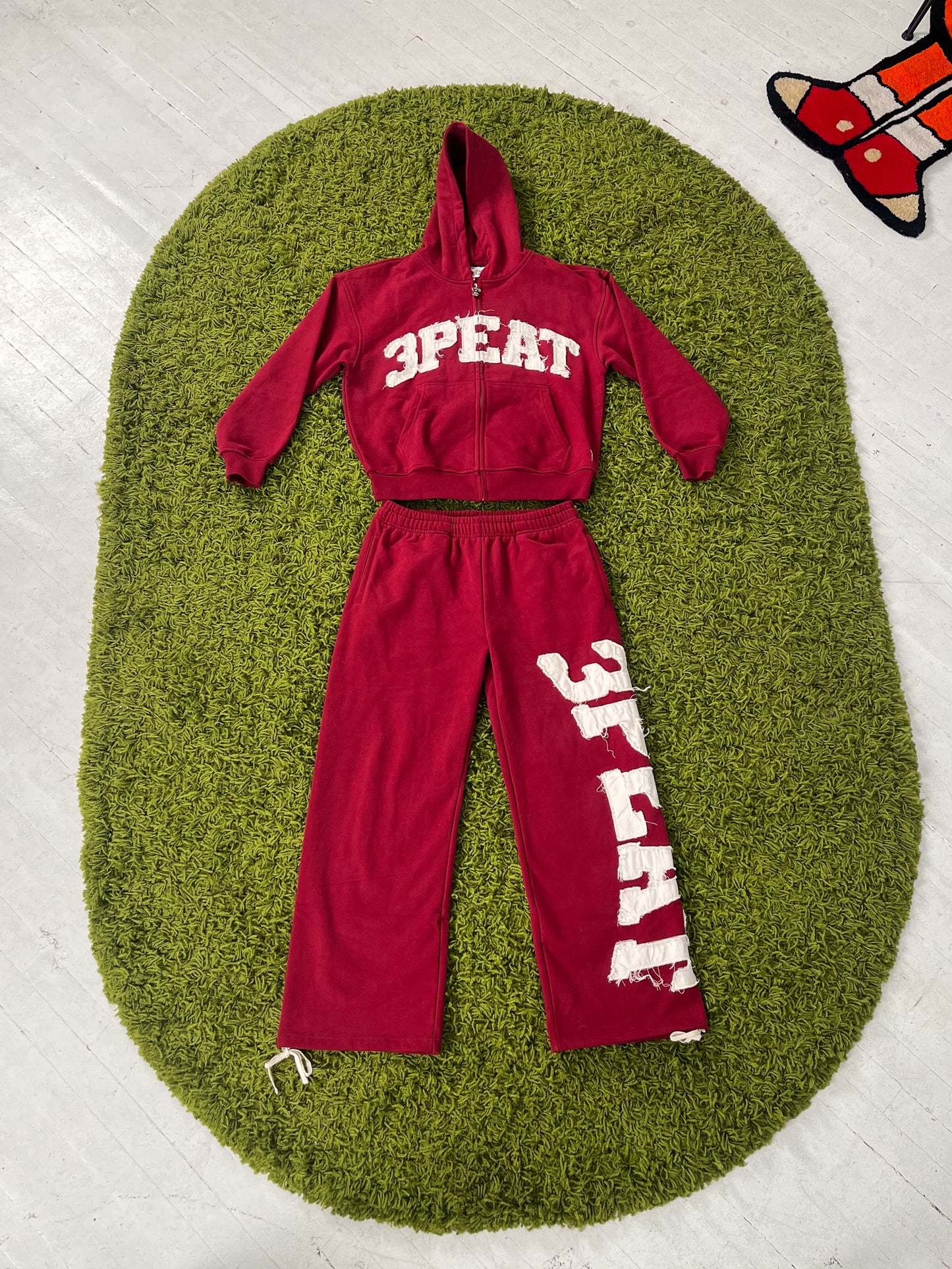 RED VARSITY SWEATPANTS